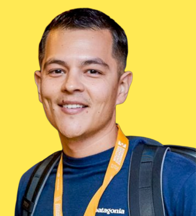 Man with lanyard at marketing conference 2026