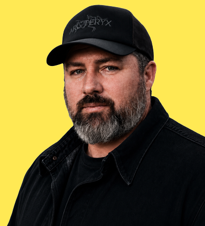 Man in black cap and jacket at marketing conference 2026