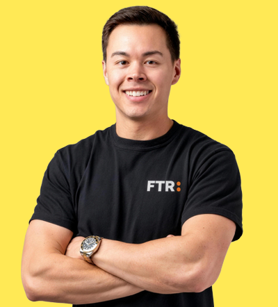 Man in FTR t-shirt smiles at marketing conference 2026