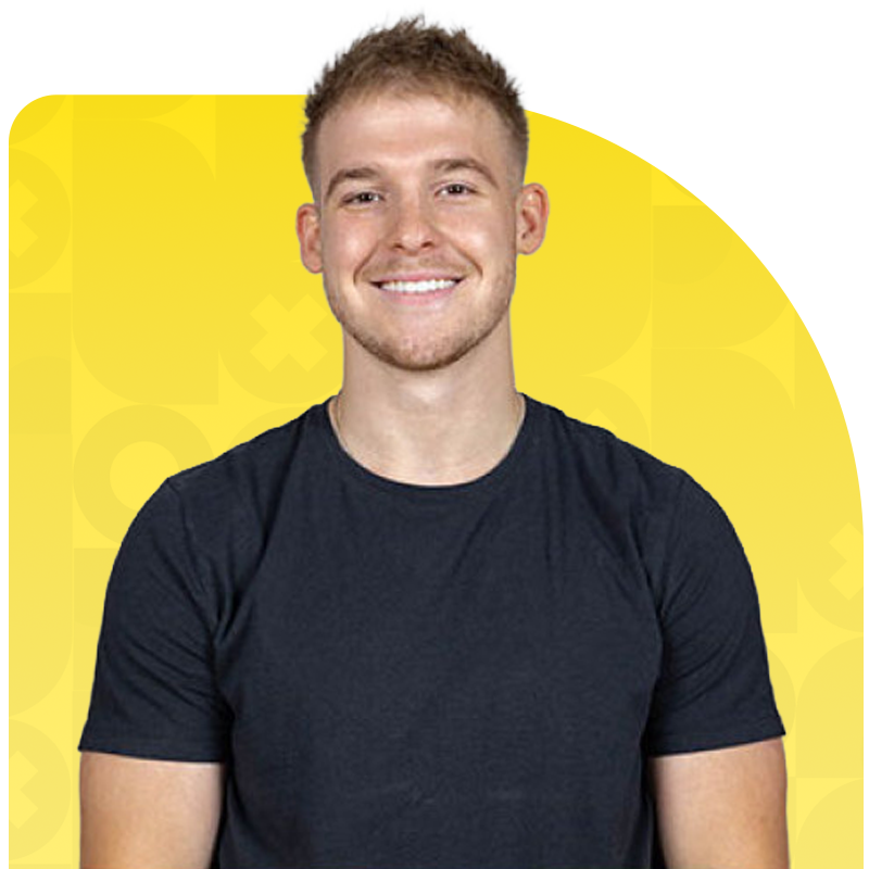 Smiling young man with short blonde hair wearing a black t-shirt